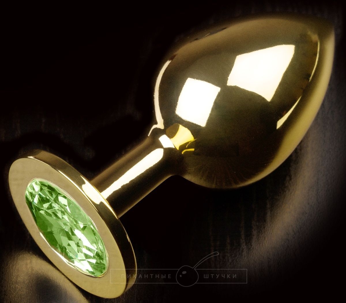 Золотистая анальная пробка с салатовым кристаллом - 9 см. - фото 307007