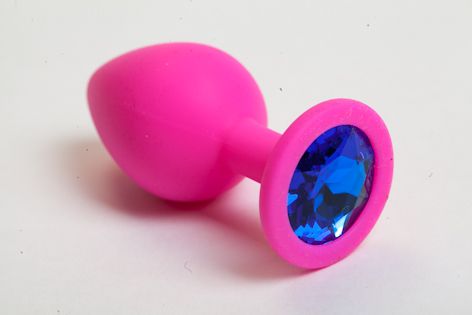 Розовая силиконовая анальная пробка с синим стразом - 8,2 см. - фото 315064