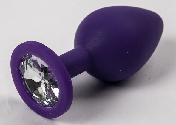 Фиолетовая силиконовая анальная пробка с прозрачным стразом - 8,2 см. - фото 315070