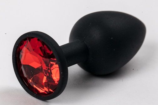 Черная силиконовая анальная пробка с красным стразом - 7,1 см. - фото 147366