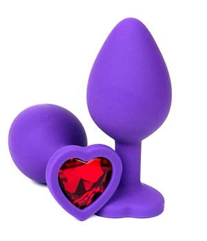 Фиолетовая силиконовая анальная пробка с красным стразом-сердцем - 8 см.