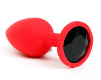 Красная силиконовая анальная пробка с черным стразом - 6,8 см.