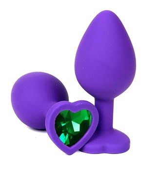 Фиолетовая силиконовая анальная пробка с зеленым стразом-сердцем - 8,5 см.