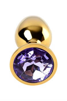 Золотистая коническая анальная пробка с фиолетовым кристаллом - 7 см.