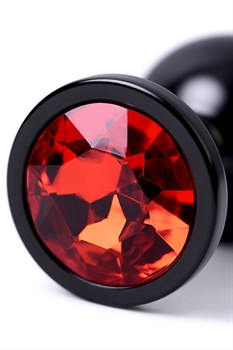 Черный анальный плаг с кристаллом красного цвета - 8,2 см.
