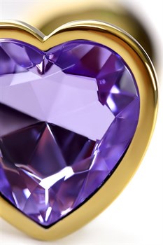 Золотистая анальная втулка с фиолетовым кристаллом-сердечком - 7 см.