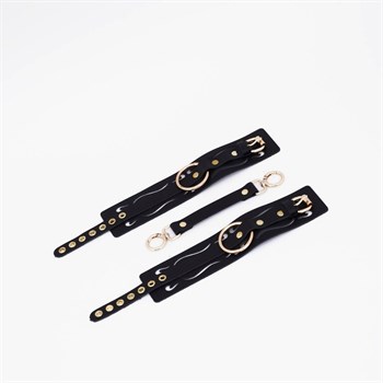 {{productViewItem.photos[photoViewList.activeNavIndex].Alt || productViewItem.photos[photoViewList.activeNavIndex].Description || 'Черные кожаные оковы с золотистой фурнитурой'}}