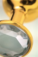 Золотистая маленькая анальная втулка с прозрачным кристаллом - 6 см. - фото 1385940
