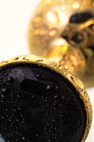 Маленькая золотистая анальная втулка с чёрным кристаллом - 7,2 см. ToyFa 712006 - фото 606763