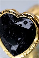 Золотистая коническая анальная пробка с черным кристаллом-сердечком - 7 см.  - фото 1294934