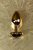 Золотистая коническая анальная пробка с черным кристаллом-сердечком - 7 см.  - фото 1294932
