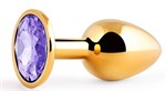 Золотистая анальная пробка с фиолетовым стразом - 7,2 см. - фото 301218
