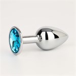 Серебристая анальная втулочка с голубым кристаллом - 7 см. - фото 1420429