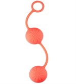 Оранжевые вагинальные шарики с цветочками на поверхности - фото 1391538