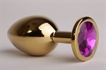 Золотистая анальная пробка с филетовым кристаллом - 8,2 см. - фото 148786