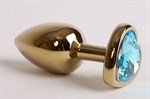 Золотистая анальная пробка с голубым стразиком-сердечком - 7,5 см. - фото 148788