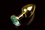 Маленькая золотистая анальная пробка с круглым кончиком и изумрудным кристаллом - 7 см. - фото 150069