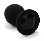Чёрная силиконовая анальная пробка с чёрным кристаллом - 7 см. - фото 158120
